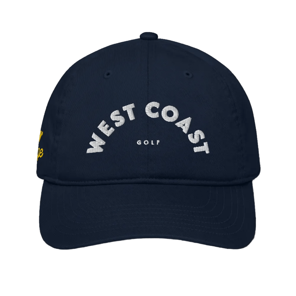 Navy blue cap with &#39;West Coast Golf&#39; text on a black background