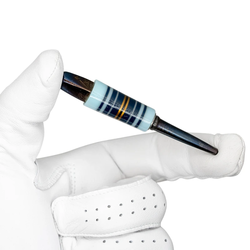 Stanley Punch Golf Divot Tool - Nordic Royalty in golf glove