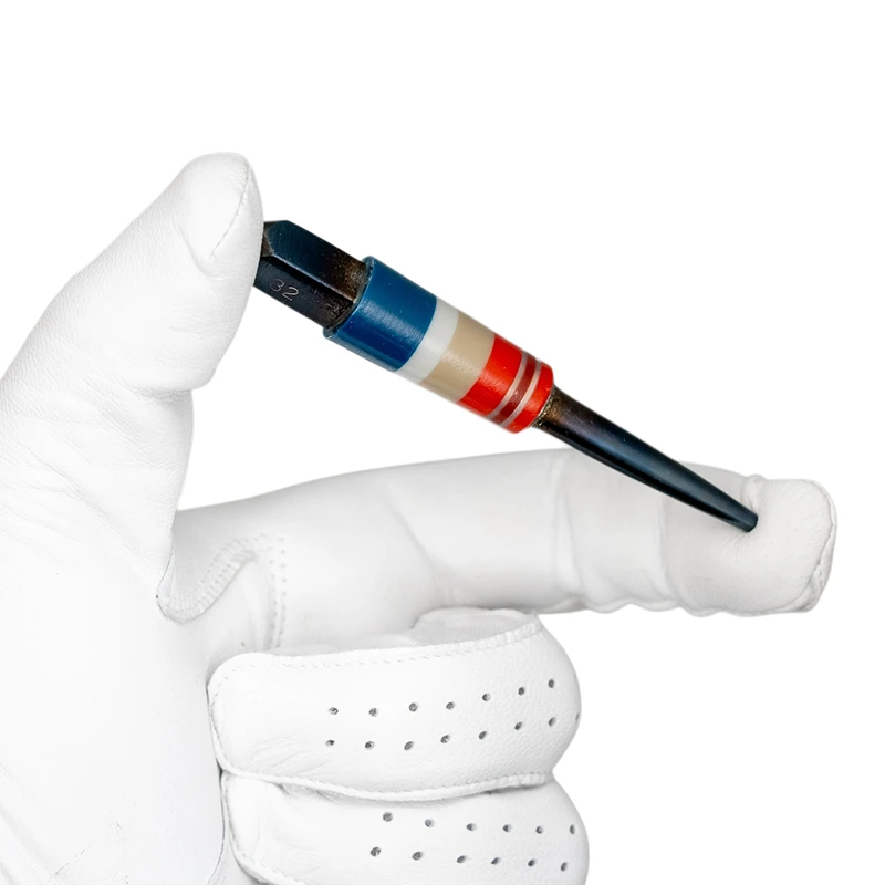 Stanley Punch Golf Divot Tool - Quadraphonic in golf glove