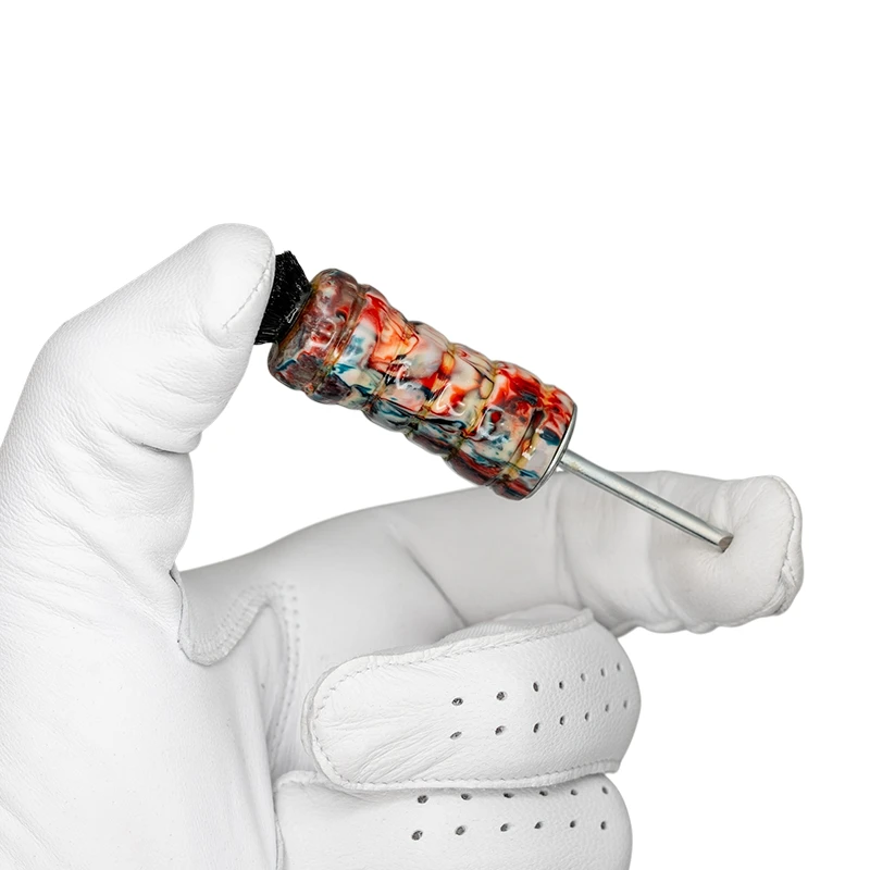 Tidy Tool Golf Divot Fixer - Alumilite Jawbreaker in golf glove