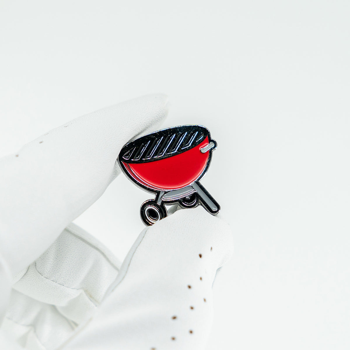 bbq grill weber red golf ball marker matchstick in white golf glove