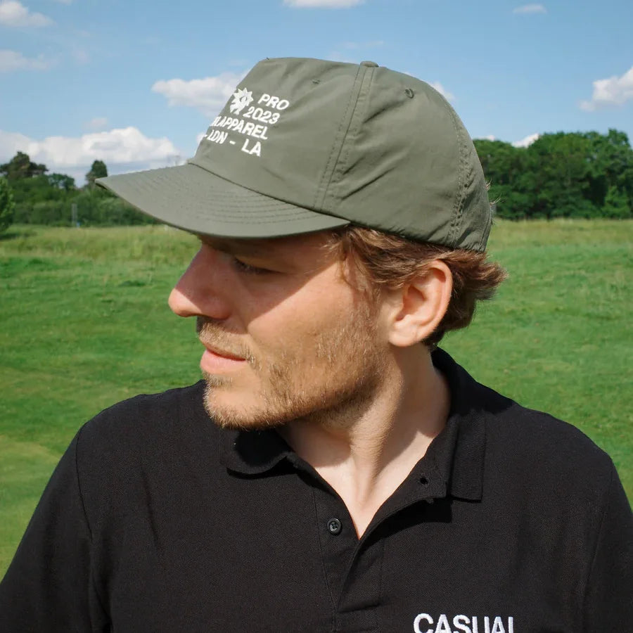 casual pro hat green on man