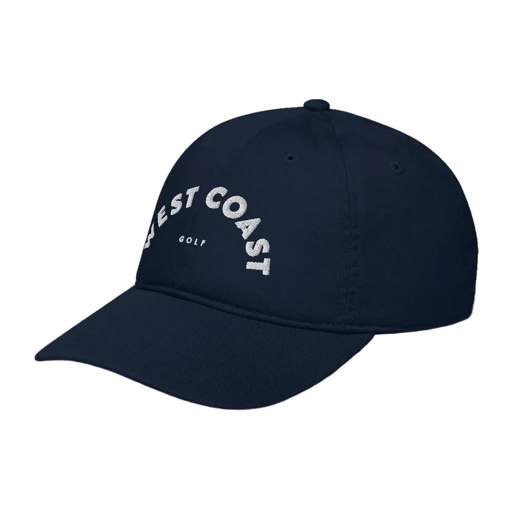 Navy blue cap with &#39;West Coast Golf&#39; text on a black background