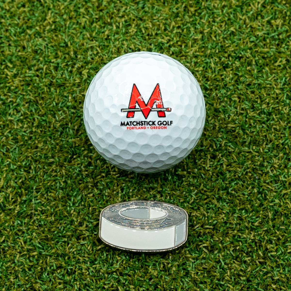 lead tape chronicles roll golf ball marker golf ball on grass