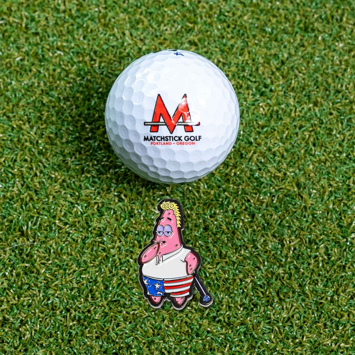 patrick star john daly golf ball marker on grass with ball