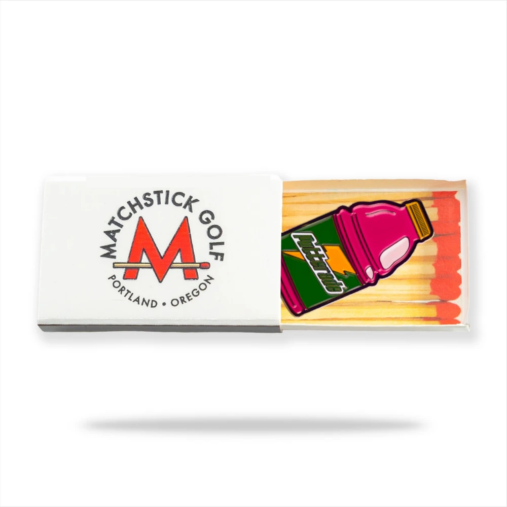 pink putterade golf ball marker inside matchbox packaging