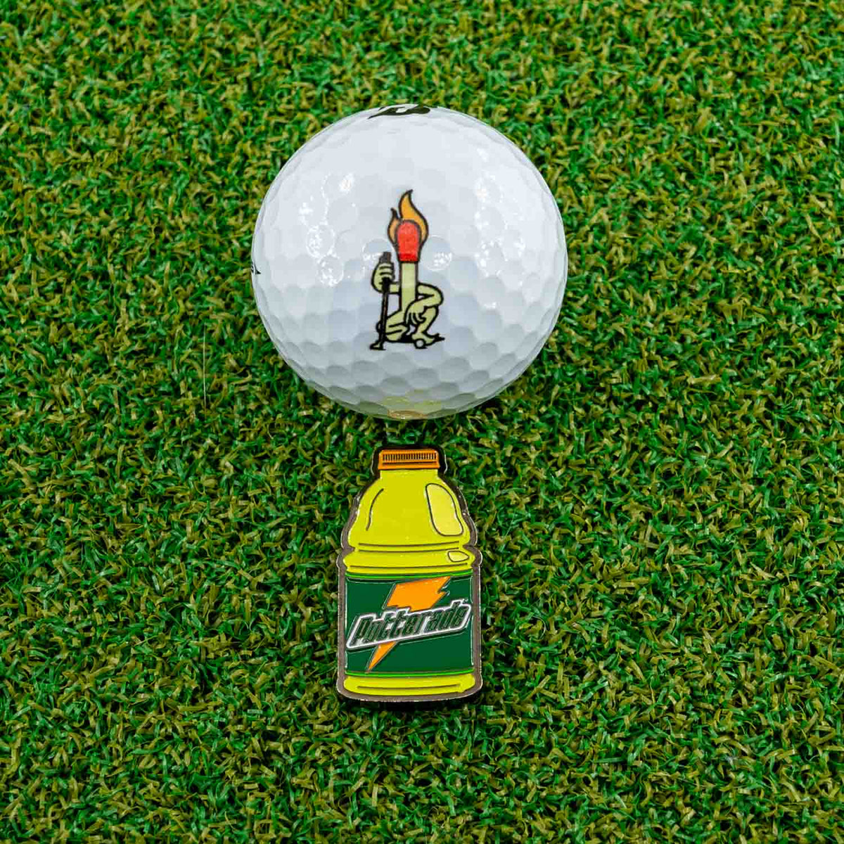 putterade golf ball marker gatorade yellow green lemon lime golf ball grass