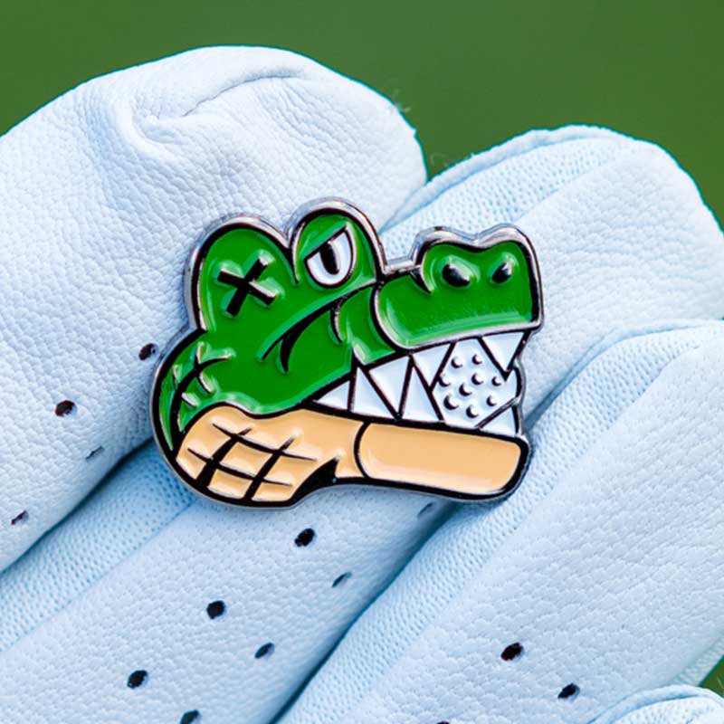one eyed alligator happy gilmore chubbs golf ball marker in glove fingers
