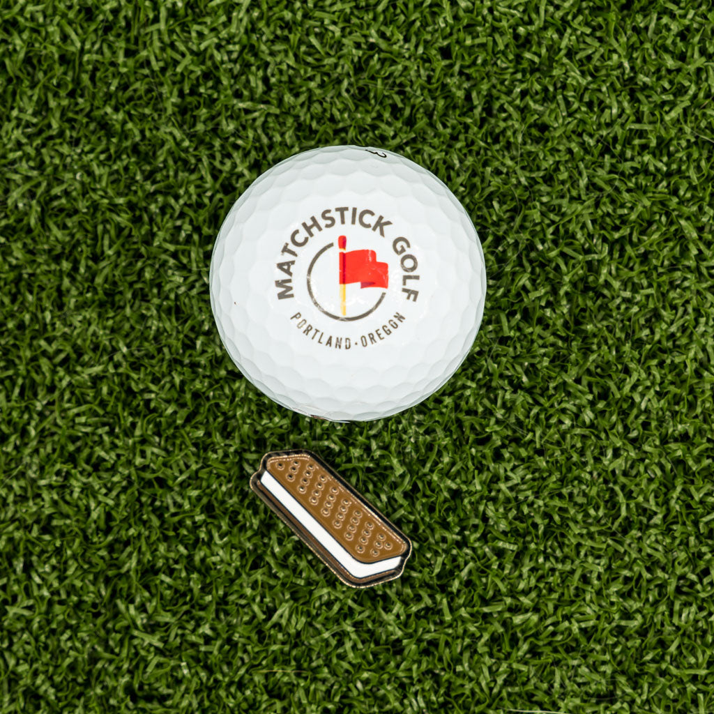 ice cream sandwich golf ball marker with golf ball