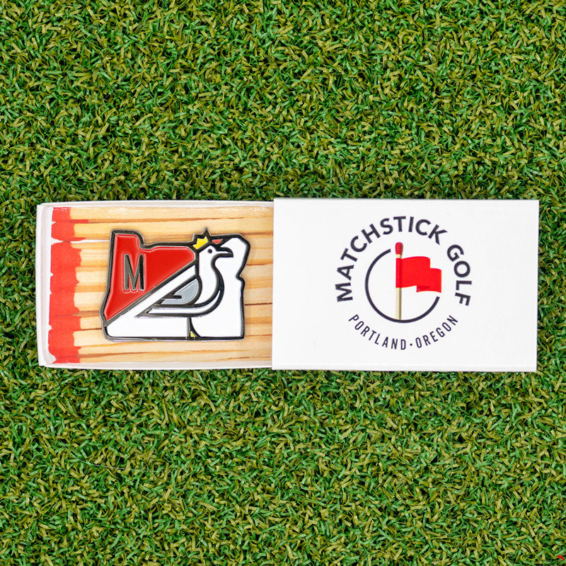 king seve the seagull spirit of oregon manzanita links golf ball marker matchbox packaging