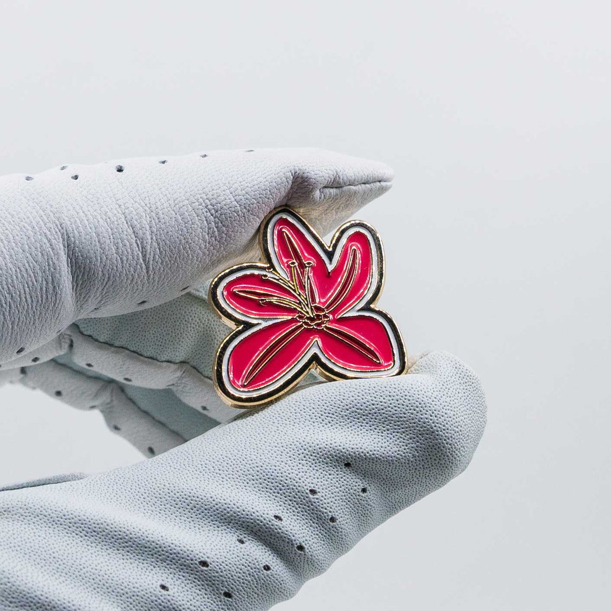 Masters Azalea Flower Golf Ball Marker in golf glove