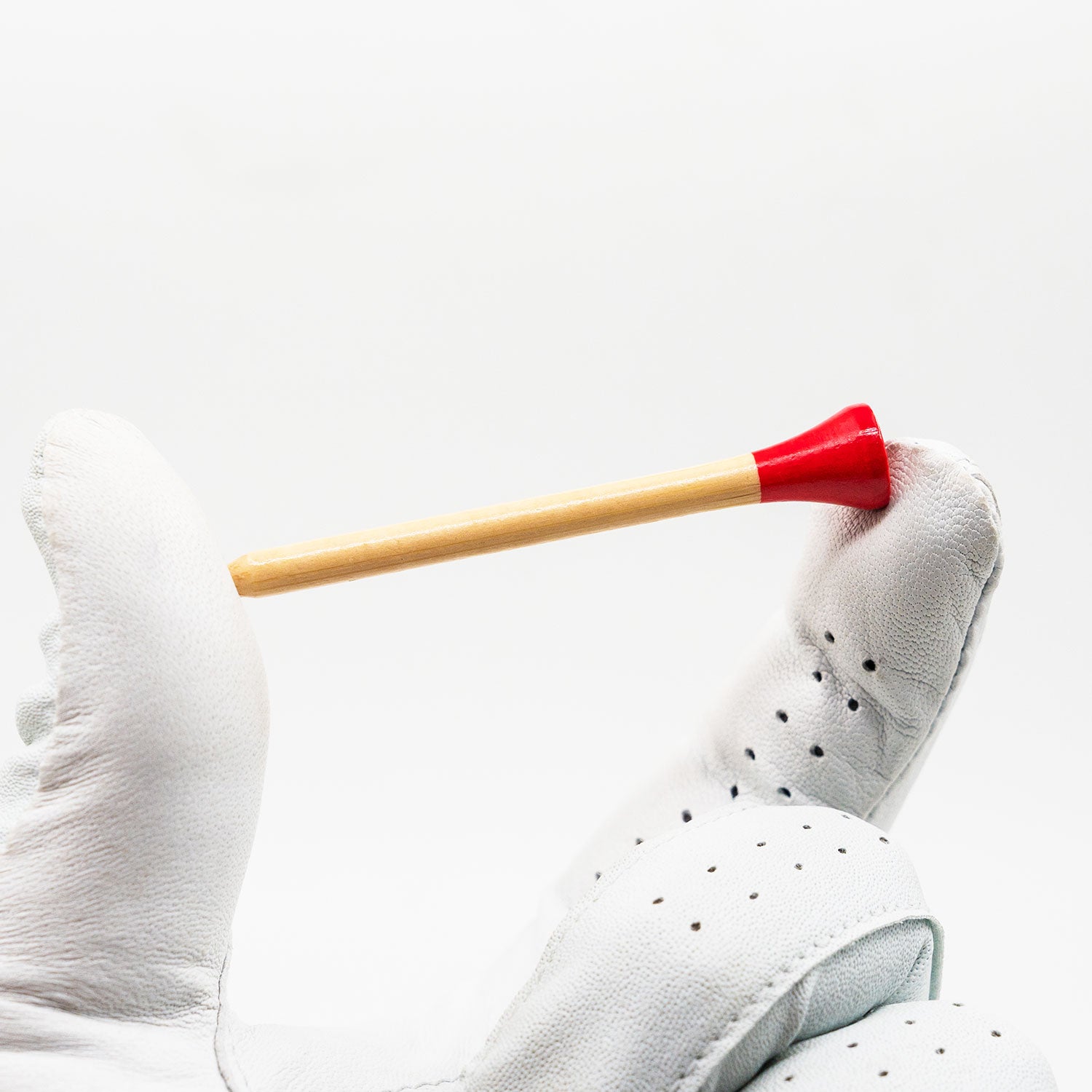 matchstick golf bamboo tees glove close up