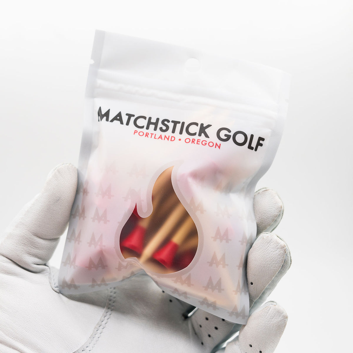 matchstick golf bamboo tees in bag main and golf glove