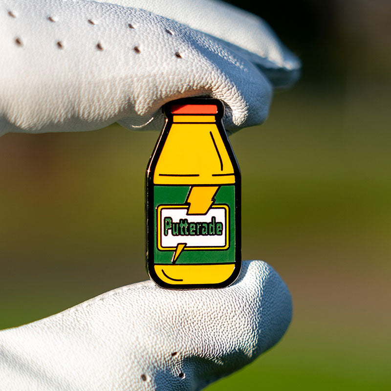 gatorade bottle golf ball marker in golf glove fingers