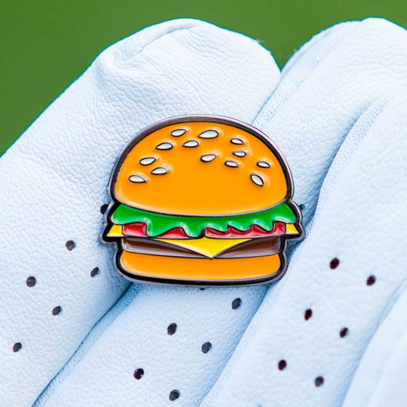 royale cheeseburger golf ball marker textured magnetic held in glove palm